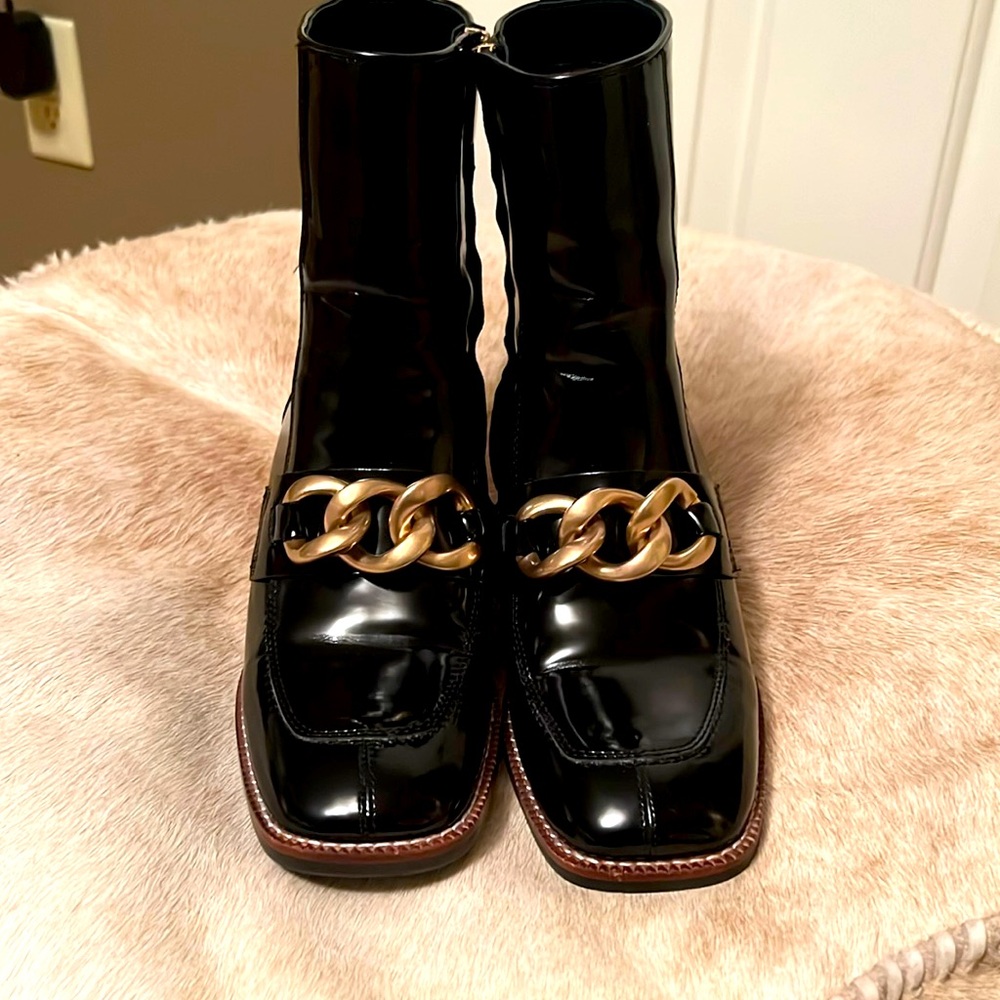 Steve Madden Black Patent Leather Heeled Boots with Gold Chain Accent